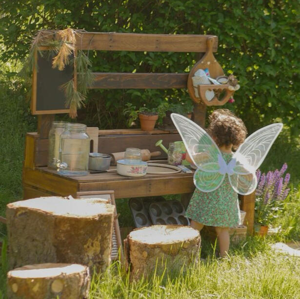 Children exploring nature through outdoor learning at The Bloom Room nursery in the UAE